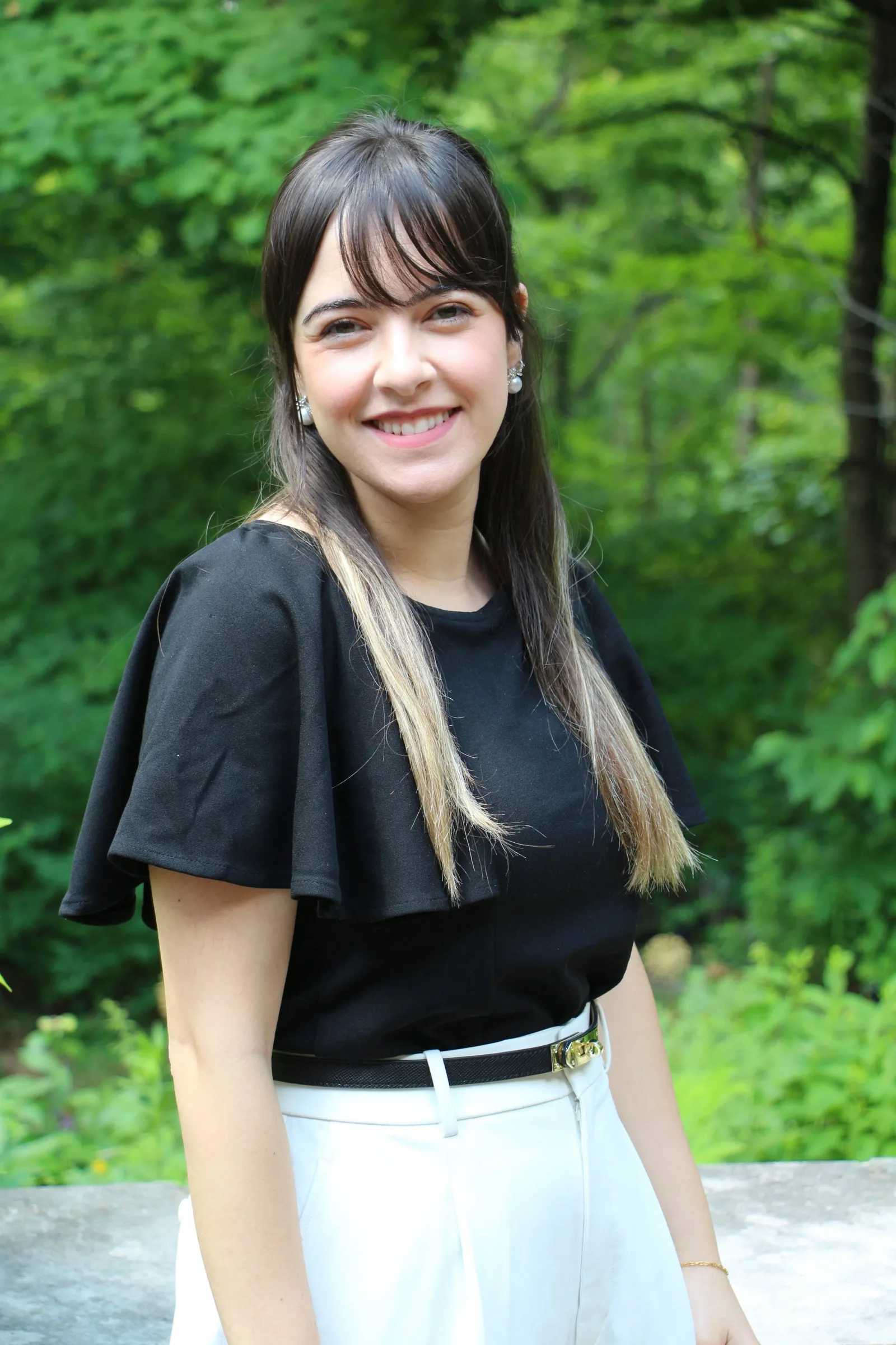 Portrait of Ruba Chihabi smiling outdoors